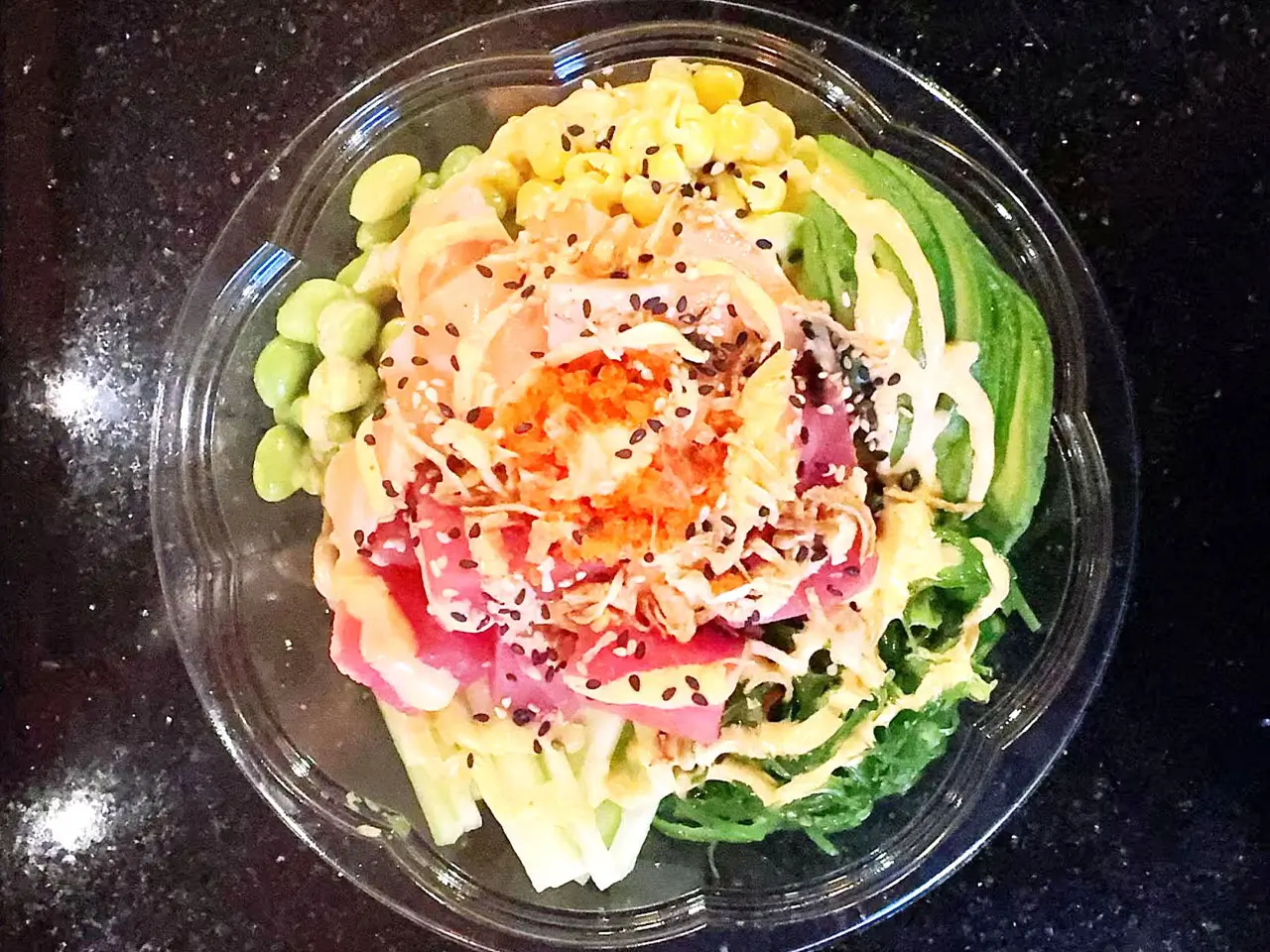 Seafood Poke Bowl Fresh seafood, veggies, and sesame in a bowl